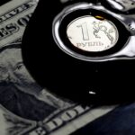 Rouble steadies near 80 vs dollar, stocks inch lower