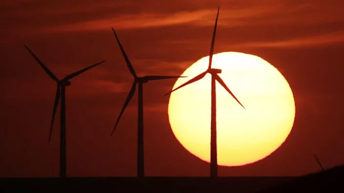 Sun Set on Wind farm - Energy News Beat