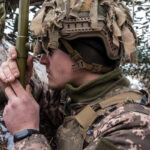 A Ukrainian looks towards the border in New York- Ukrain - Getty Images