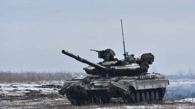 Ukrainian servicemen drive a tank during drills at a training ground in unknown location in Ukraine -ENB