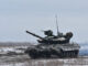Ukrainian servicemen drive a tank during drills at a training ground in unknown location in Ukraine -ENB
