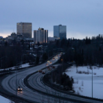 Traffic near downtown Anchorage - Alaskan cities could get windfall money to help with infrastructure needs.