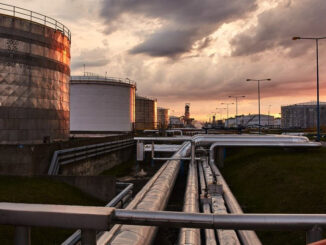 Pipework runs between storage silos at an oil refinery in Gdansk -Poland
