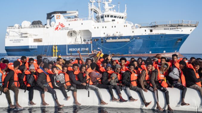 Italy detains migrant rescue ship, fines charity