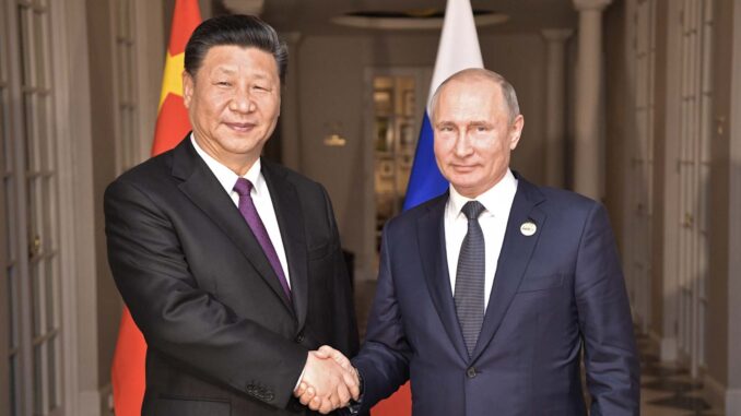 China's President Xi Jinping with Russia's President Vladimir Putin
